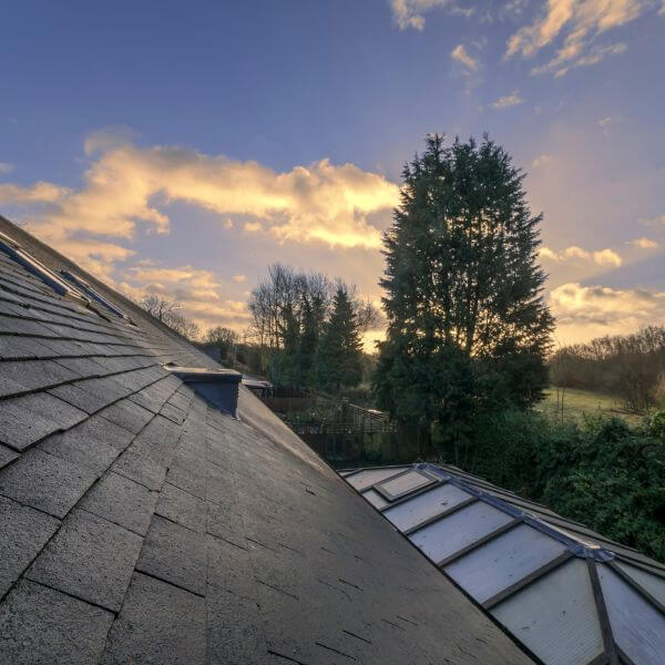 Roofing Guys Gold Coast completed roof maintenance at an aged care facility at sunset, delivering safe, quiet, and compliant roofing solutions.
